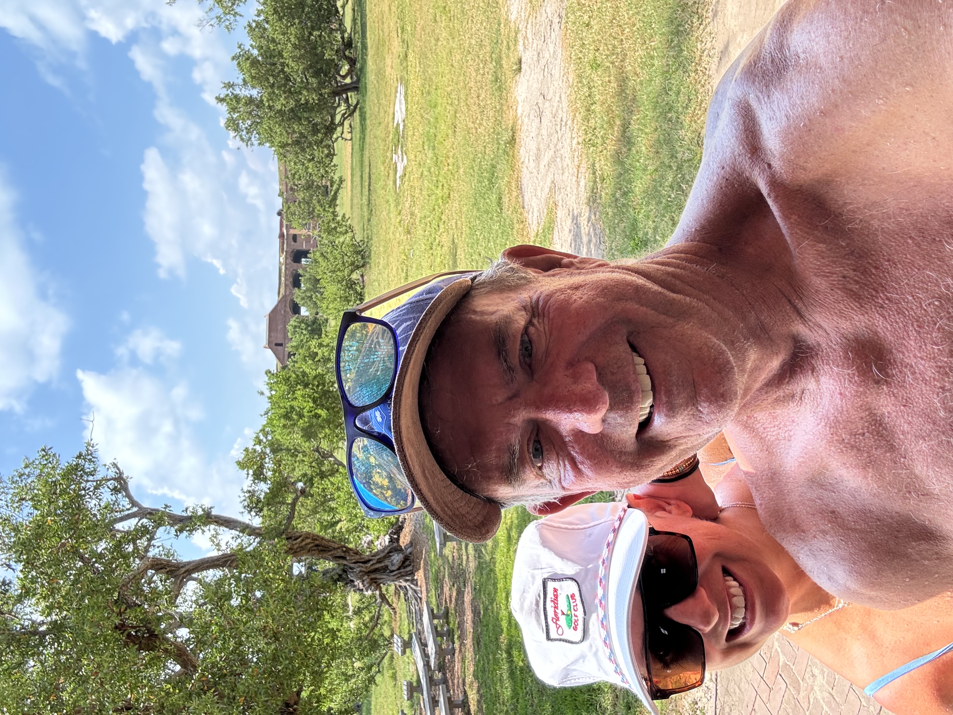 Mac and Laura outdoors on a sunny day in the Florida Keys